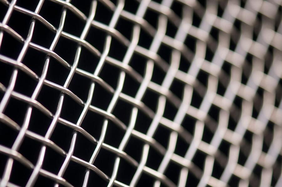 Close view of galvanized hardware cloth, the half-inch steel mesh used to close rat openings