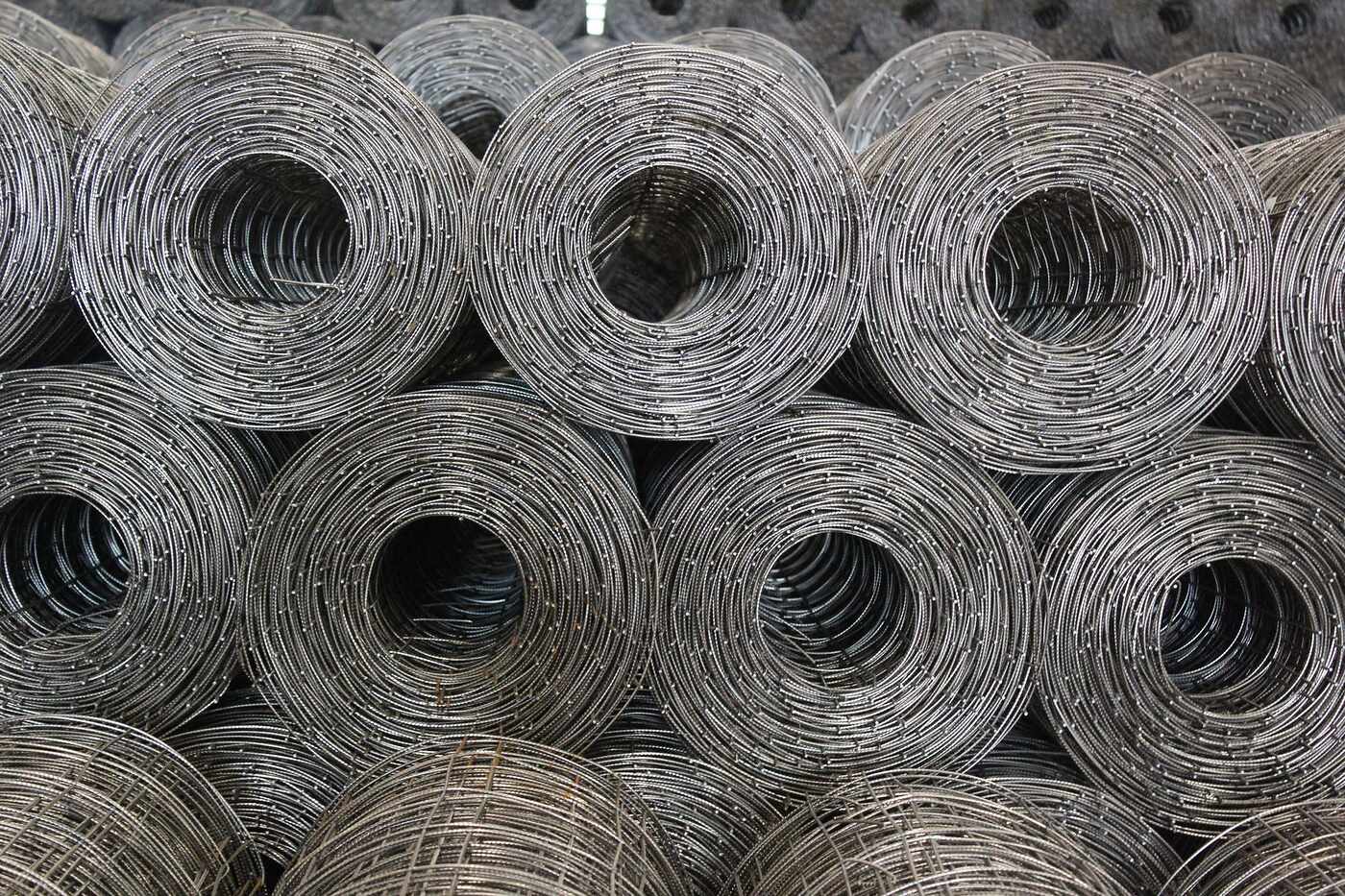 Rolls of galvanized steel mesh stacked ready for exclusion work